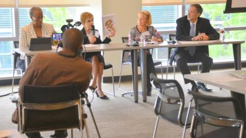 From left, Justice Bobbe Bridge, Judge Patricia Clark, Director of Catholic Community Services's Integrated Family Preservation Service Mary Stone Smith, and CEO of the National CASA Association Michael Piraino explained their efforts to find safe, loving, and permanent homes for foster youth.